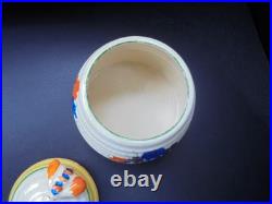 A Clarice Cliff bee hive honey pot in AUTUMN CROCUS pattern