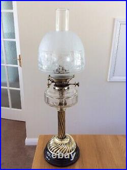 A Victorian Duplex Oil Lamp and Beehive Shade